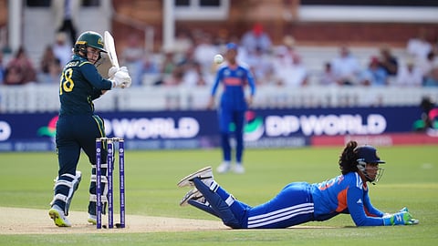 Australia's Phoebe Litchfield and India's wicketkeeper Richa Ghosh during the Women's T20 World Cup cricket match between India and Australia at Lord's Cricket Ground, in London, Sunday June 28, 2026.