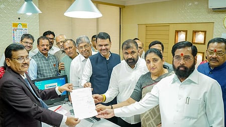 Sachin Ahir with Eknath Shinde and Maharashtra CM Fadnavis.