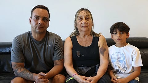 Grian Serrano, left, his mother, Ingrid Rochabrun, and his son, Gael, sit at the home where they are staying with their relatives in Caracas, Venezuela after surviving the back-to-back earthquake that destroyed their apartment building in Caraballeda, Monday, June 29, 2026.