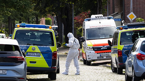 Forensic investigators on a street in Stade, Germany Monday, June 29, 2026 following a shooting.