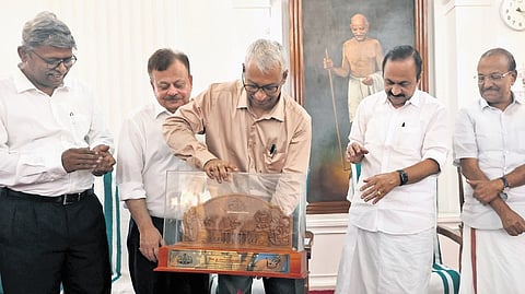 Outgoing chief secretary A Jayathilak with the farewell memento presented to him by Chief Minister V D Satheesan during a function at the Secretariat Durbar Hall in Thiruvananthapuram on Tuesday.