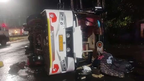 The impact of the collision caused the bus to overturn onto the road while most passengers were asleep.