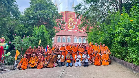 This photograph released by the Phu Manorom temple shows a group of Thai Buddhist monks posing for a picture at Phu Manorom temple in Mukdahan province, Thailand, Thursday, July 2, 2026.