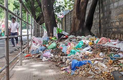 A well-constructed Bengaluru city footpath facility with safety railings lying in an unusable state due to negligence in sanitation 