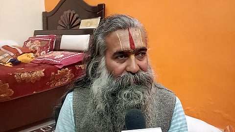 In this photo from Jan. 20, 2024, Shri Ram Janmbhoomi Teerth Kshetra trust member and Nirmohi Akhara chief Mahant Dinendra Das speaks to the media in Ayodhya.