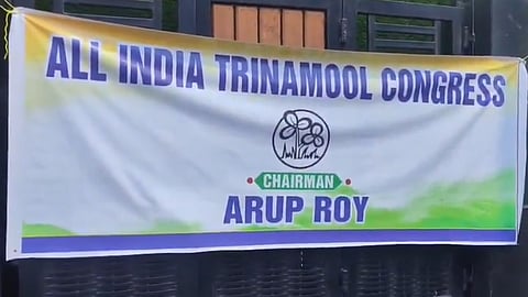 The TMC rebel faction's banner outside the party's organisational headquarters.