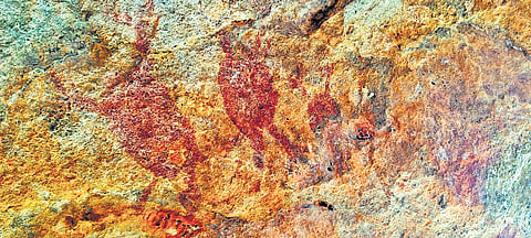 Rock paintings of tortoises & horizontal anthropomorphic figure with distinctive ornamentation on its head and neck (bottom), discovered in Mulugu hillocks