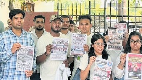 A group of protesting doctors outside the DMC office on Friday