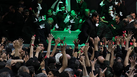 This handout picture provided by the Iranian supreme leader's office shows mourners gathering around the coffin of late supreme leader Ayatollah Ali Khamenei during a ceremony ahead of his funeral at the Imam Khomeini Husseiniyeh in Tehran on July 3, 2026.