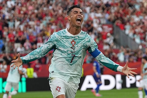 Portugal's Cristiano Ronaldo (7) celebrates after scoring their opening goal during the World Cup round of 32 soccer match between Portugal and Croatia in Toronto, Thursday, July 2, 2026.