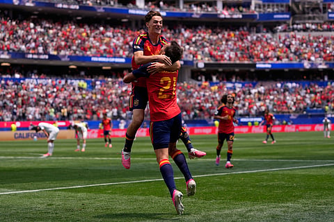 Spain's Mikel Oyarzabal (21) celebrates scoring his side's third goal against Austria with teammate Gavi during the World Cup round of 32 soccer match in Inglewood, Calif., near Los Angeles, Thursday, July 2, 2026. 