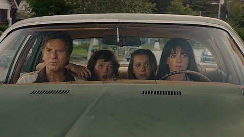 A still from Anne Hathaway's The End of Oak Street