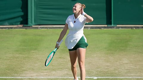 Amanda Anisimova of the United States celebrates her victory against Sofia Kenin of the United States in their second round women's singles match at the Wimbledon Tennis Championship in London, Thursday, July 2, 2026.