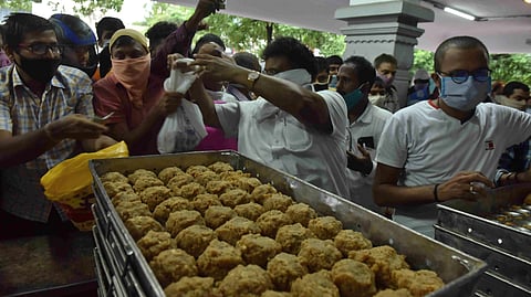 Heavy rush was seen as the TTD office as the officials started to distribute Tirumala laddu at their office first time after the lock down in Hyderabad on Sunday.