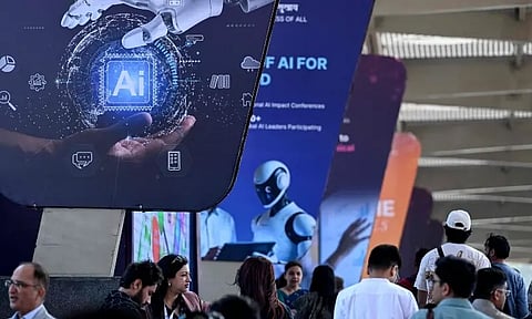 Visitors arriving to attend the AI Impact Summit in New Delhi on February 17, 2026