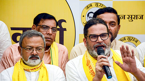 Jan Suraaj Party founder Prashant Kishor (R) addresses a press conference regarding his decision to contest the by-election to the Bankipur assembly seat, in Patna, on Sunday, July 5, 2026. 