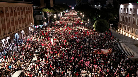 Protesters take part in a rally against plans for a luxury construction project linked to US President Donald Trump's son-in-law, Jared Kushner, in Tirana, Albania, Saturday, July 4, 2026.