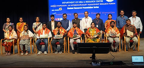 The symposium brought together students and research scholars to exchange ideas and deliberate on contemporary management challenges. 