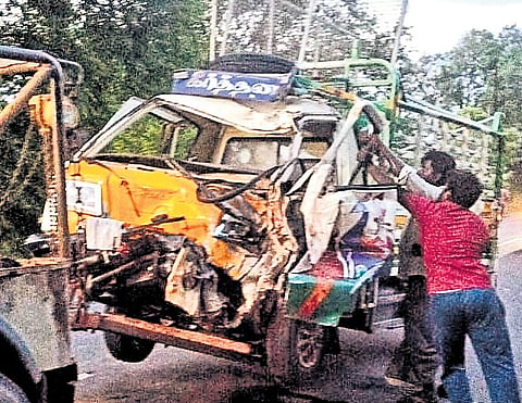 Mangled remains of the mini-lorry that rammed into the tractor tipper 