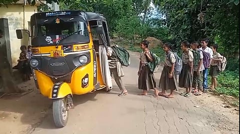The students of Mandal Parishad Primary (MPP) School, Kapusompuram going to school in an auto-rickshaw arranged by their teachers.