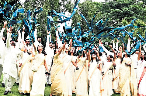 Students celebrate their graduation during the 26th convocation of IIIT- Bangalore on Sunday