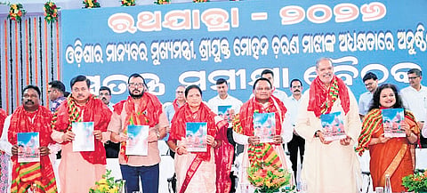 Chief Minister Mohan Charan Majhi along with several cabinet collagues releasing a handbook on Rath Yatra in Puri on Monday 