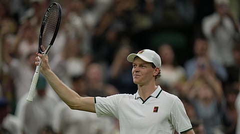 Jannik Sinner of Italy celebrates his victory against Shintaro Mochizuki of Japan in their fourth round men's singles match at the Wimbledon Tennis Championships in London, Sunday, July 5, 2026.