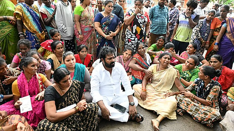 Family members of the six missing fishermen wait anxiously for their safe return at the Visakhapatnam Fishing Harbour. 
