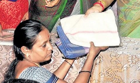 Apart from usual blue & white, sarees will also be available in green colour 