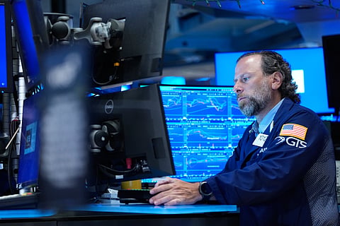 Michael Pistillo works on the floor at the New York Stock Exchange in New York, Monday, July 6, 2026. 