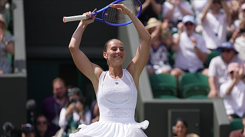 Marta Kostyuk of Ukraine dances to celebrate her victory against Ashlyn Krueger of the United States in their fourth round women's singles match at the Wimbledon Tennis Championships in London, Monday, July 6, 2026. 