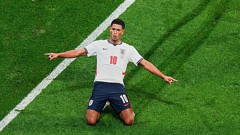 England's Jude Bellingham (10) celebrates with teammates after scoring their second goal against Mexico during the World Cup round of 16 soccer match in Mexico City, Sunday, July 5, 2026.