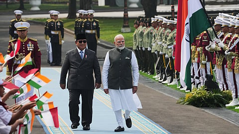 India's Prime Minister Narendra Modi, right, and Indonesia's President Prabowo Subianto inspect honor guards during the welcoming ceremony ahead of their meeting at Merdeka Palace in Jakarta, Indonesia, Tuesday, July 7, 2026. 