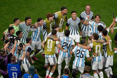 Argentinian players celebrate after the World Cup round of 16 soccer match between Argentina and Egypt in Atlanta, Tuesday, July 7, 2026. 