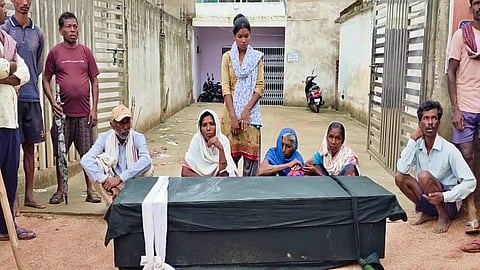 In protest, the family brought the body to the bank after his death.