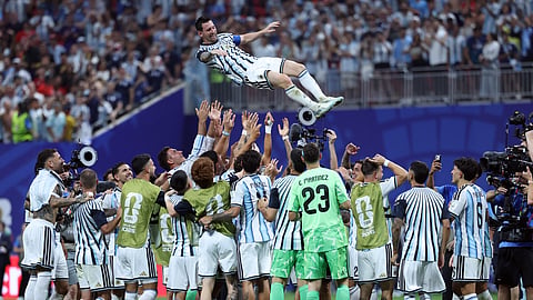 Argentina's forward #10 Lionel Messi celebrates with teammates after winning the 2026 World Cup round of 16 football match between Argentina and Egypt at Atlanta Stadium in Atlanta on July 7, 2026.