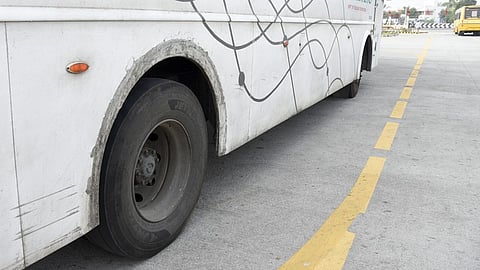 An SETC bus with a poorly maintained tyre at the Panjappur Integrated Bus Terminal in Tiruchy.