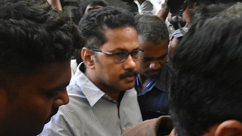 Police produce Krishnalanka CI Nagaraju who is involved in rowdy sheeter Sai Krishna in the court in Vijayawada on Wednesday. 