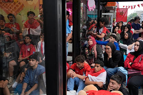 Egyptian soccer fans react as they watch the end of a World Cup soccer game between Egypt and Argentina, in New York, Tuesday, July 7, 2026.