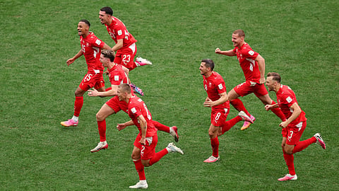 Switzerland's players celebrate after winning the 2026 World Cup round-of-16 football match against Colombia at Vancouver Stadium in Vancouver on July 7, 2026.