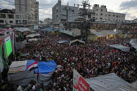 Palestinians watch a live broadcast of the World Cup round of 16 soccer match between Argentina and Egypt in Nuseirat, central Gaza Strip, Tuesday, July 7, 2026. 