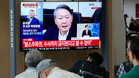 A TV screen shows an image of former South Korea President Yoon Suk Yeol during a news program at the Seoul Railway Station in Seoul, South Korea, Thursday, July 9, 2026.