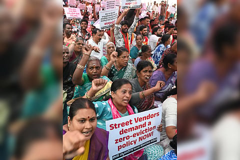 Street vendors protest against their eviction under the ‘Safe Footpath’ campaign, at Freedom Park on Wednesday. 