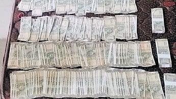 Cash seized from the mining officer.