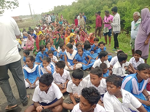 Villagers blocking the road at Kandariapatana to prevent the officials from carrying out the demolition drive.