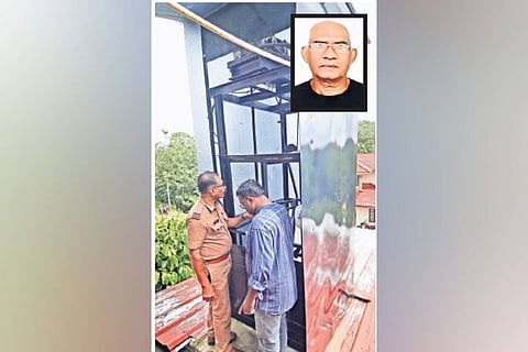 Officials inspecting the lift in which Mathukutty (inset) was trapped 