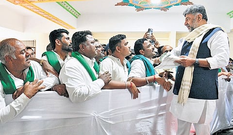 Chief Minister DK Shivakumar listens to grievances from people at Suvarna Vidhana Soudha in Belagavi on Thursday.