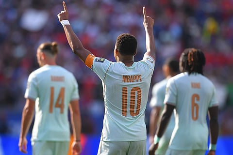 France's Kylian Mbappé (10) celebrates scoring the opening goal during the World Cup quarterfinal soccer match between France and Morocco in Foxborough, Mass., near Boston, Thursday, June 9, 2026.