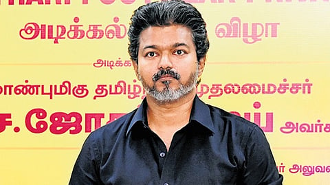 CM Vijay laying the foundation for the footwear unit in Karur district via videoconferencing on Friday