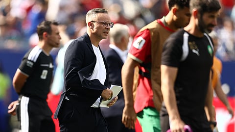 Morocco's head coach Mohamed Ouahbi gestures during the 2026 World Cup football tournament quarter-final match between France and Morocco at Boston Stadium in Foxborough on July 9, 2026. 